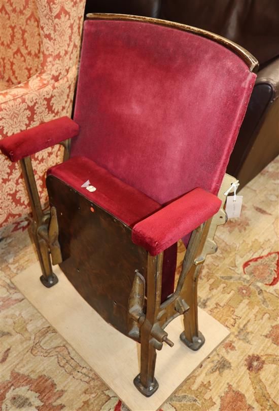 A vintage folding cinema seat